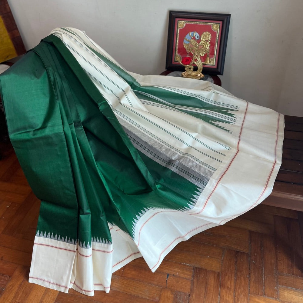 Bottle Green with off white in Temple border in korvai Kanchipuram silks