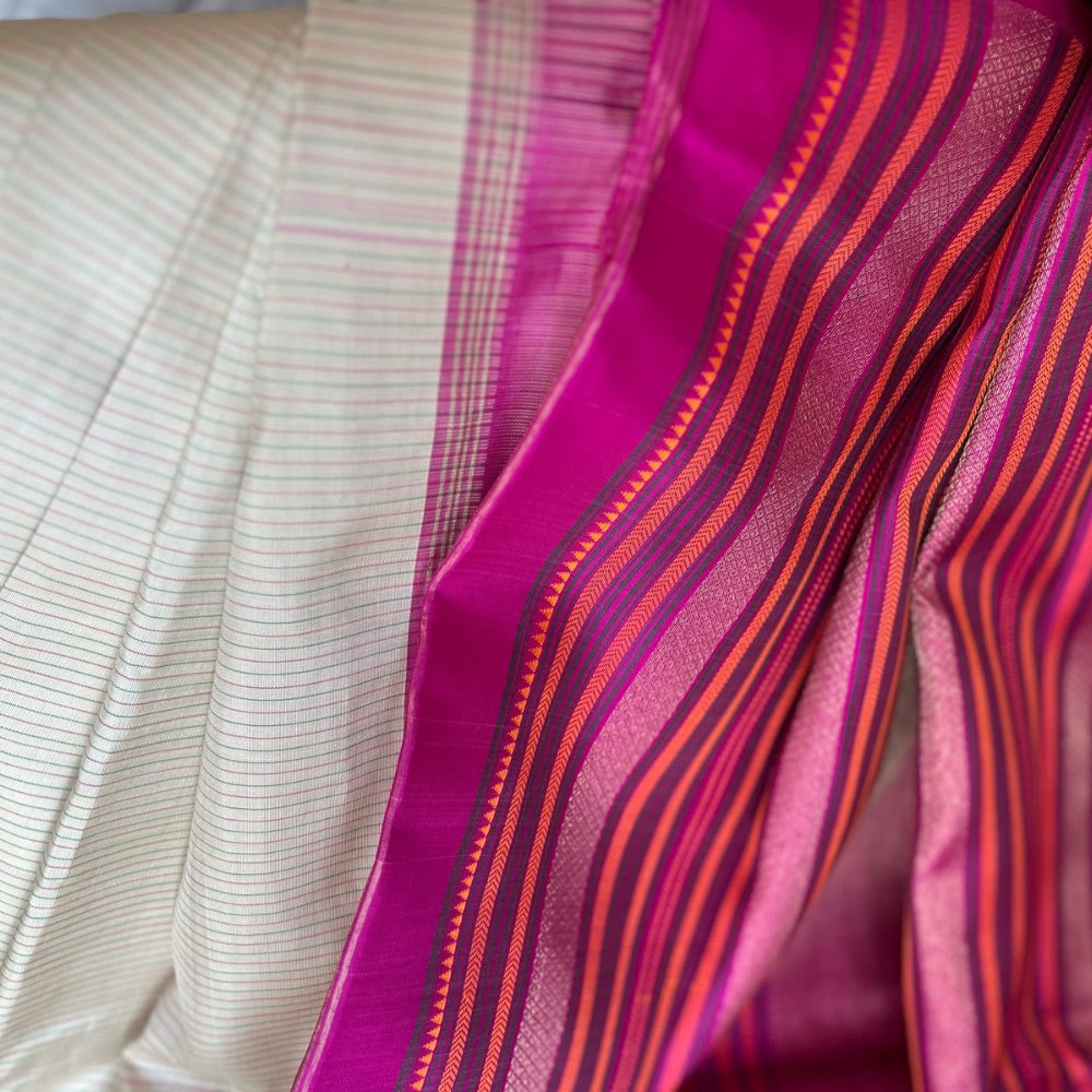 Varisei pettu, in beige and Rani pink Kanchipuram silk