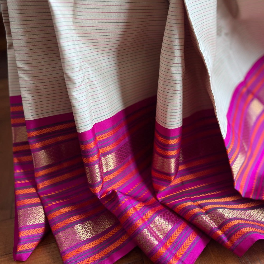 Varisei pettu, in beige and Rani pink Kanchipuram silk