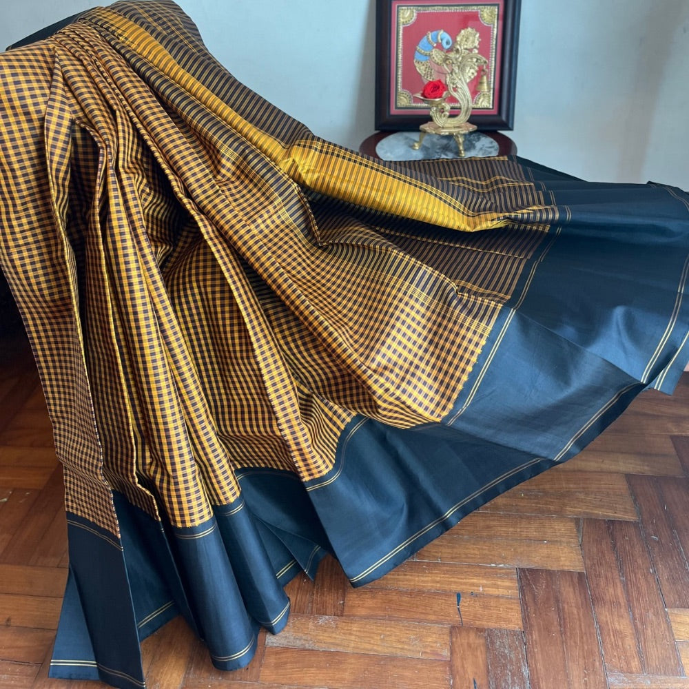 Black with mustard kasa kasa kattam Kanchipuram silks in vintage style border