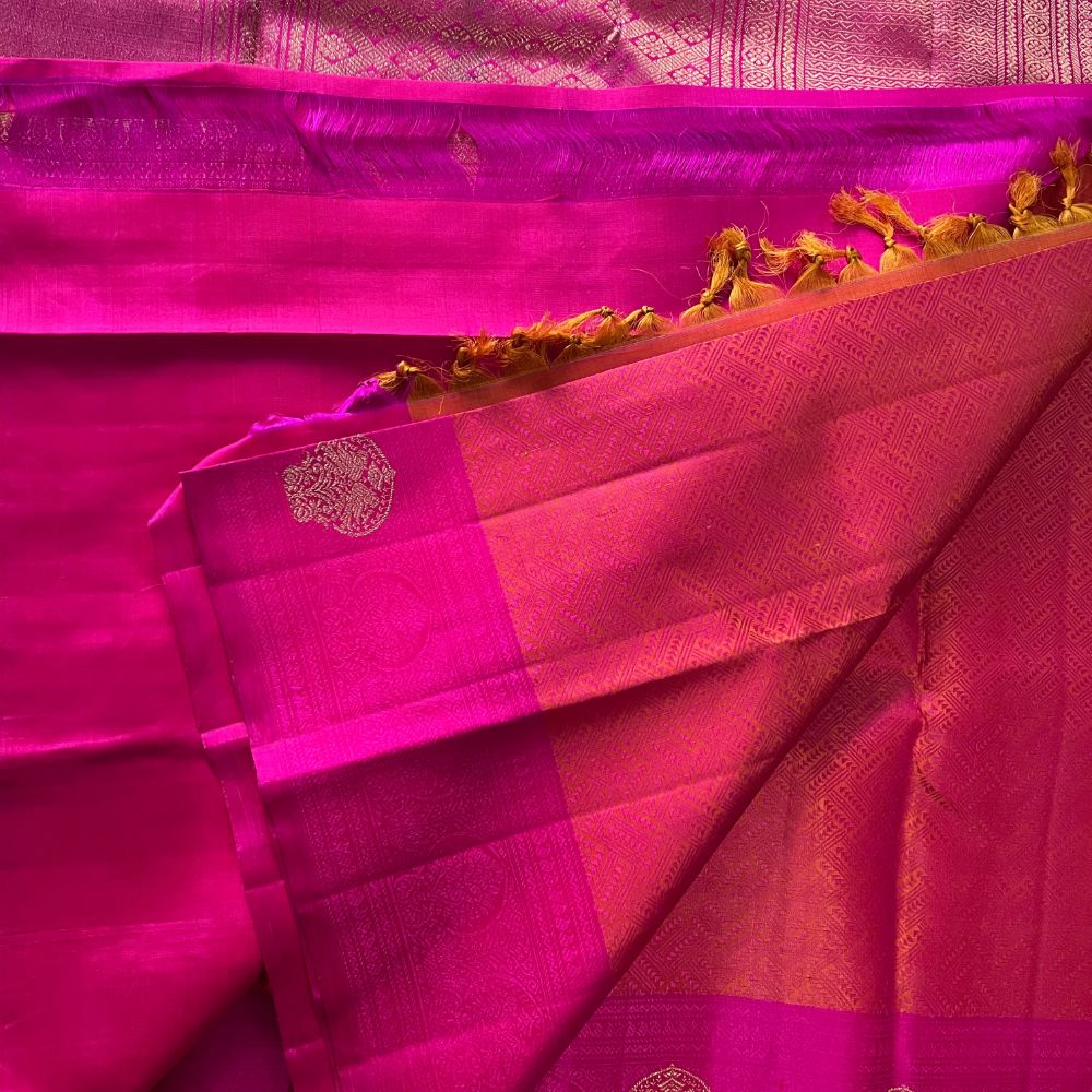 Deep pink with Orange jacquard rich zari in pallu