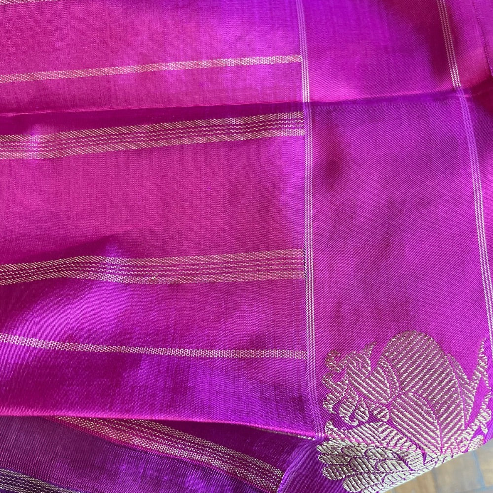 Deep maroon with pink border and zari pallu with Mayil chankram motif on border