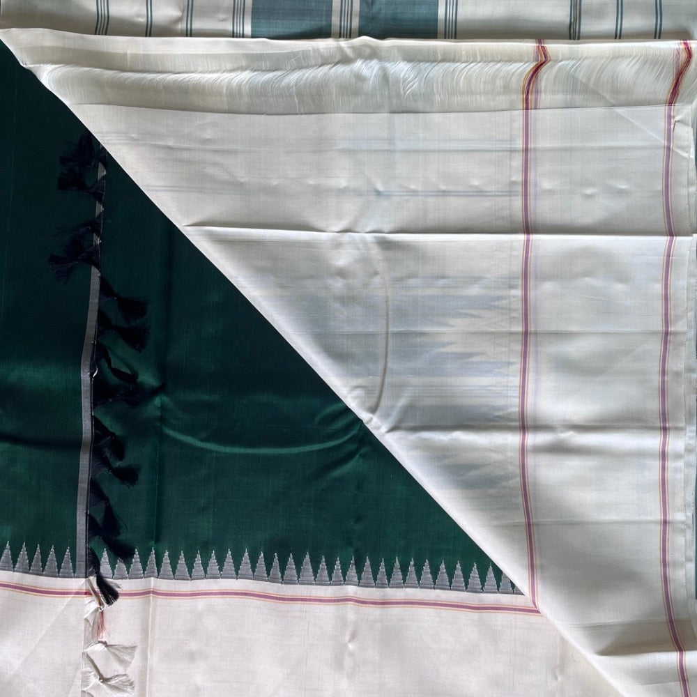 Bottle Green with off white in Temple border in korvai Kanchipuram silks