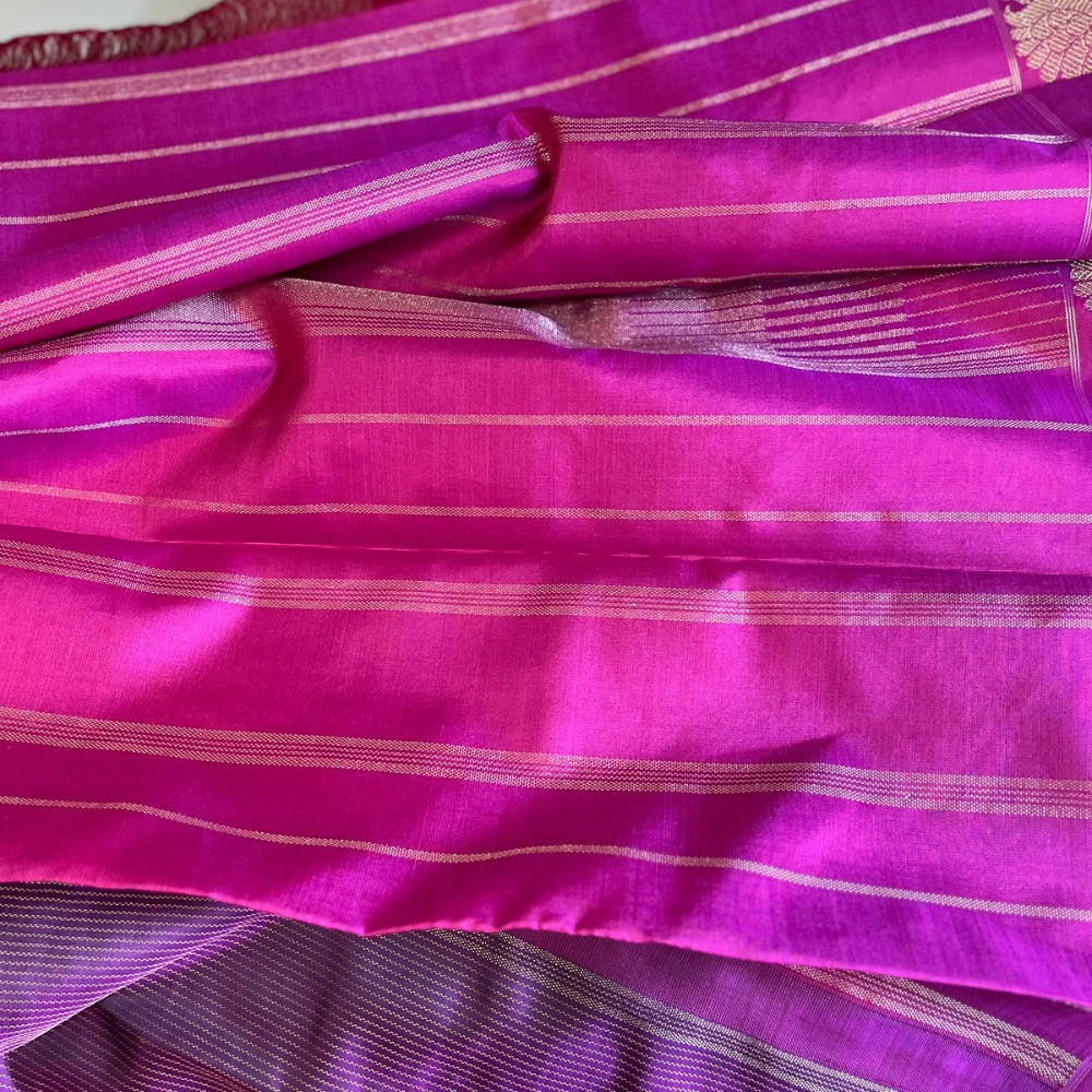 Deep maroon with pink border and zari pallu with Mayil chankram motif on border